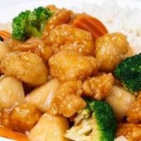 Sweet & Sour Chicken · Crispy chicken with pineapple, red bell peppers, and onions in a sweet & sour sauce.