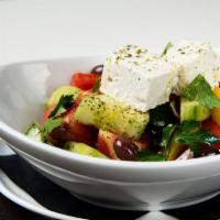 Greek Salad · Vine ripened tomatoes, cucumbers, green peppers, onions, olives, feta and extra virgin olive...