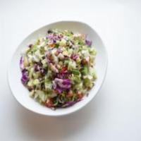 Chopped Salad · Bacon, chicken, red cabbage, tomato, carrots, onion, pasta, and Gorgonzola cheese. Served wi...