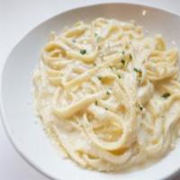 Fettuccini Alfredo · Served with a roll.