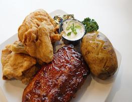 Chicken and Rib Dinner · 4 pieces of chicken and a 1/2 slab of ribs. Served with a roll, house salad, and fries.