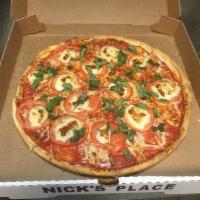 Margarita Pizza · Fresh mozzarella, basil and sliced tomatoes.