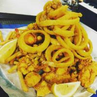 Fisherman's Dinner Plate · Lightly Battered Haddock , Scallops, , Shrimp, Clams & Lobster Served with choice of 2 sides...
