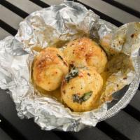 3 Garlic Knots · Our famous dough covered with fresh basil, garlic and our own seasoning. Served with a side ...
