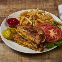 Burger Melt Lunch · 1/3 lb hamburger with melted cheese, onions and tomato on grilled light rye. Served with Fre...