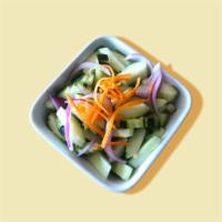 Cucumber Salad · cucumber, onion, carrot, served with vinaigrette dressing