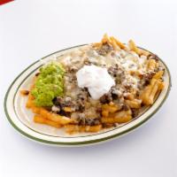 Carne Asada Fries · French fries with steak, beans, cheese, sour cream and guacamole.