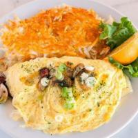 Farmer Omelet · Ham, sausage, bacon, onions and bell peppers with 3-cheese blend. Prepared with 4 farm fresh...