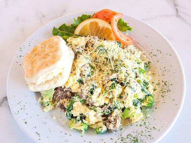 Joe's Special  · Ground beef, spinach, mushroom, onions sauteed with scrambled eggs topped with Parmesan cheese, served with choice of biscuit or toast.