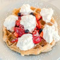Stuffed Belgian Waffle · Crispy Belgian waffle topped with fresh strawberries and whipped cream.