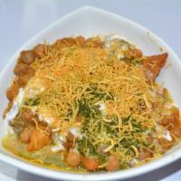 Aloo Tikki Chaat  2 tikkis · Potato patties with garbanzo beans and topped with yogurt, tamarind sauce and mint chutney.