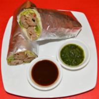 Spicy Seekh Kabab Kaati Roll · Fresh flour  with ground lamb seasoned with ginger, green chilies and spices. Served with mi...