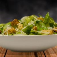 Chicken Caesar Salad · Romaine lettuce, shredded Romano cheese, croutons and Caesar dressing.
