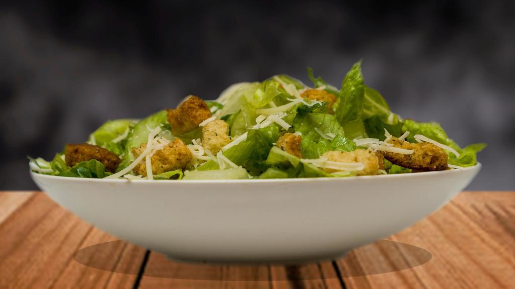 Chicken Caesar Salad · Romaine lettuce, shredded Romano cheese, croutons and Caesar dressing.
