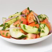 Chicken Mediterranean Salad · Romaine lettuce, tomato and cucumber salad and , feta cheese and balsamic vinaigrette.