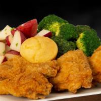 4 Pieces Dark Crispy Chicken Combo · 2 legs and 2 thighs. Served with 2 sides and corn bread.