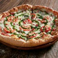 Kosmic Karma Pie · Mellow red sauce with feta cheese, mozzarella, spinach, Sun dried roasted tomatoes and Roma ...