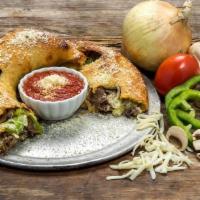 Steak and Cheese Calzone · Grilled, shaved all-natural ribeye steak with mushrooms, onions, green peppers, seasoned ric...