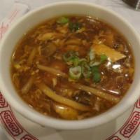 21. Hot and Sour Soup · Served with crispy noodles. Hot and spicy.
