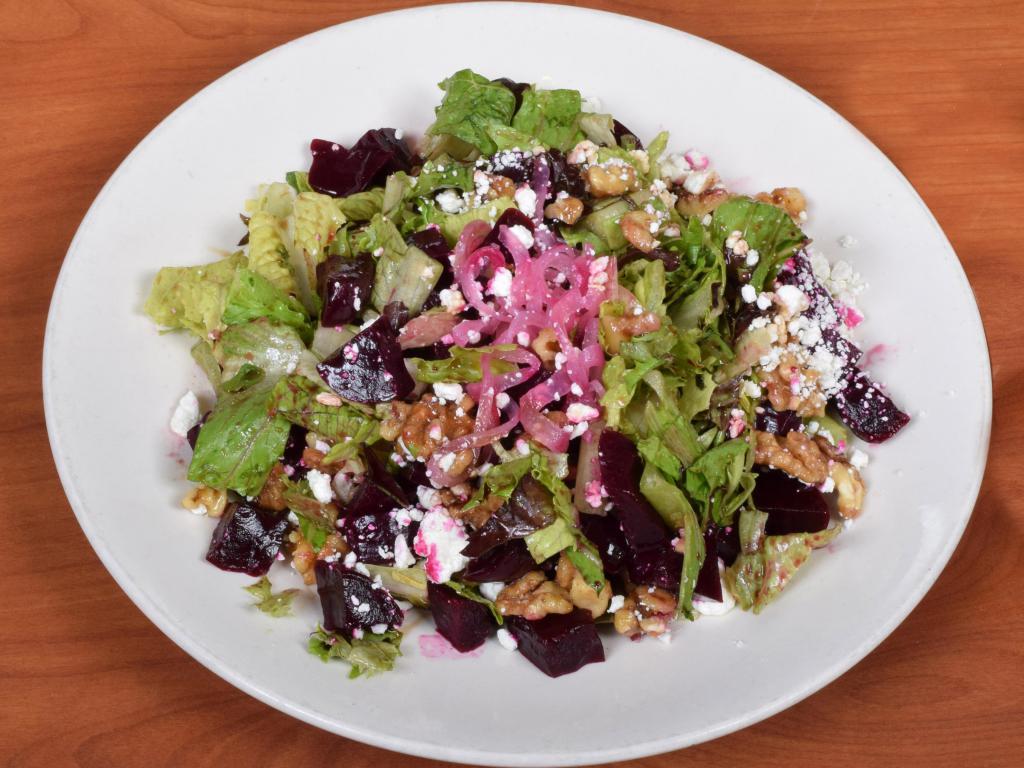 Red Beet Salad · Mixed greens, romaine, honey glazed walnuts, goat cheese and with our honey balsamic dressing.