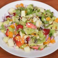 Chopped Summer Salad · Mix greens, romaine, mandarin oranges, strawberries,
green apples, red onion, sunflower see...
