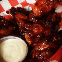 Chicken Wings · Choose a flavor - BBQ, buffalo, crack sauce (sweet&spicy), or naked. 7 wings, served with 1 ...
