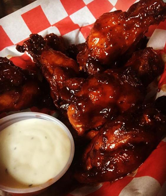 Chicken Wings · Choose a flavor - BBQ, buffalo, crack sauce (sweet&spicy), or naked. 7 wings, served with 1 ranch or blue cheese