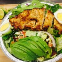 Classic Cobb Salad · Grilled or fried chicken, hard-boiled egg, bacon, bleu cheese, avocado, red onion, tomato an...