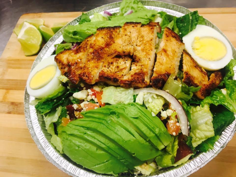Classic Cobb Salad · Grilled or fried chicken, hard-boiled egg, bacon, bleu cheese, avocado, red onion, tomato and blue cheese dressing.