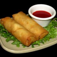 Egg Rolls · Chicken, shrimp and cabbage wrapped in a thin pancake and deep-fried to a crisp.