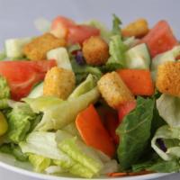 House Salad · Served with 1 small side of dressing.