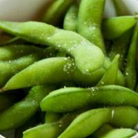 Edamame · Served warm and sprinkled with sea salt.