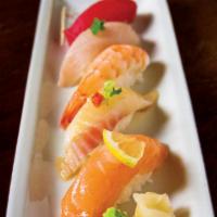 Sushi Sampler · Tuna, salmon, snapper, yellowtail and shrimp nigiri.