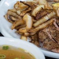 Hibachi Steak · New York strip steak and mushrooms hibachi grilled to your specification.