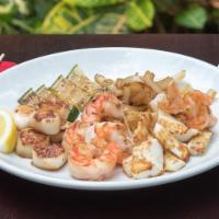 Surf Side · Grilled colossal shrimp, calamari and tender sea scallops.