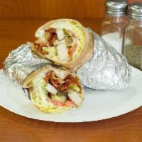 The Brick Wrap · Grilled chicken, bacon, lettuce, tomatoes, guacamole, ranch.