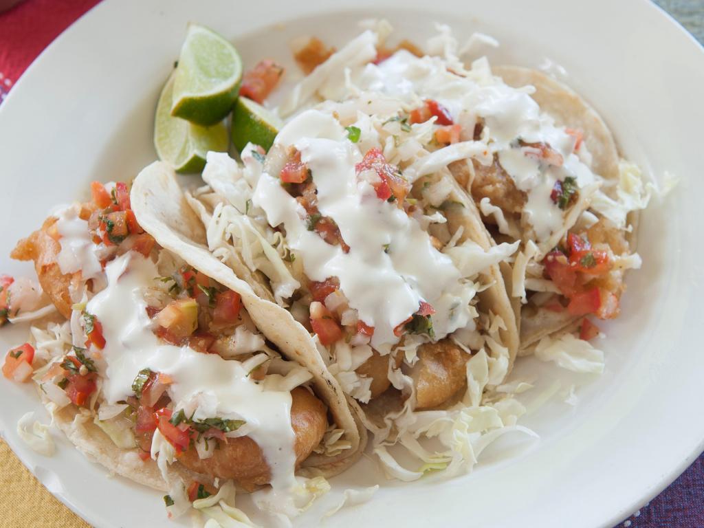 Baja Shrimp Taco · Crispy battered fish and shrimp, topped with cabbage, pico de gallo and mayonnaise.