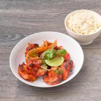 Chicken Tikka · Chicken cubes flavored with Indian spices and cooked in tandoor. Served with rice or naan.