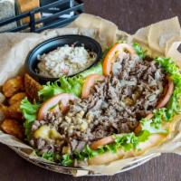 Logan Villager · Overstuffed steak sub, American cheese, fried onions, lettuce, tomato and mayonnaise.