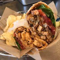 Merritt Blvd Hit · Grilled chicken tossed in Buffalo sauce with lettuce, tomatoes and blue cheese on a wrap.