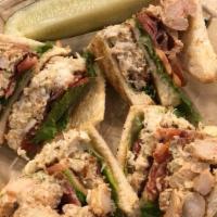 Seafood Club · Lump Crab Cake, Shrimp Salad, Bacon, Lettuce, Tomato, Mayo on 3 pieces of White Toast