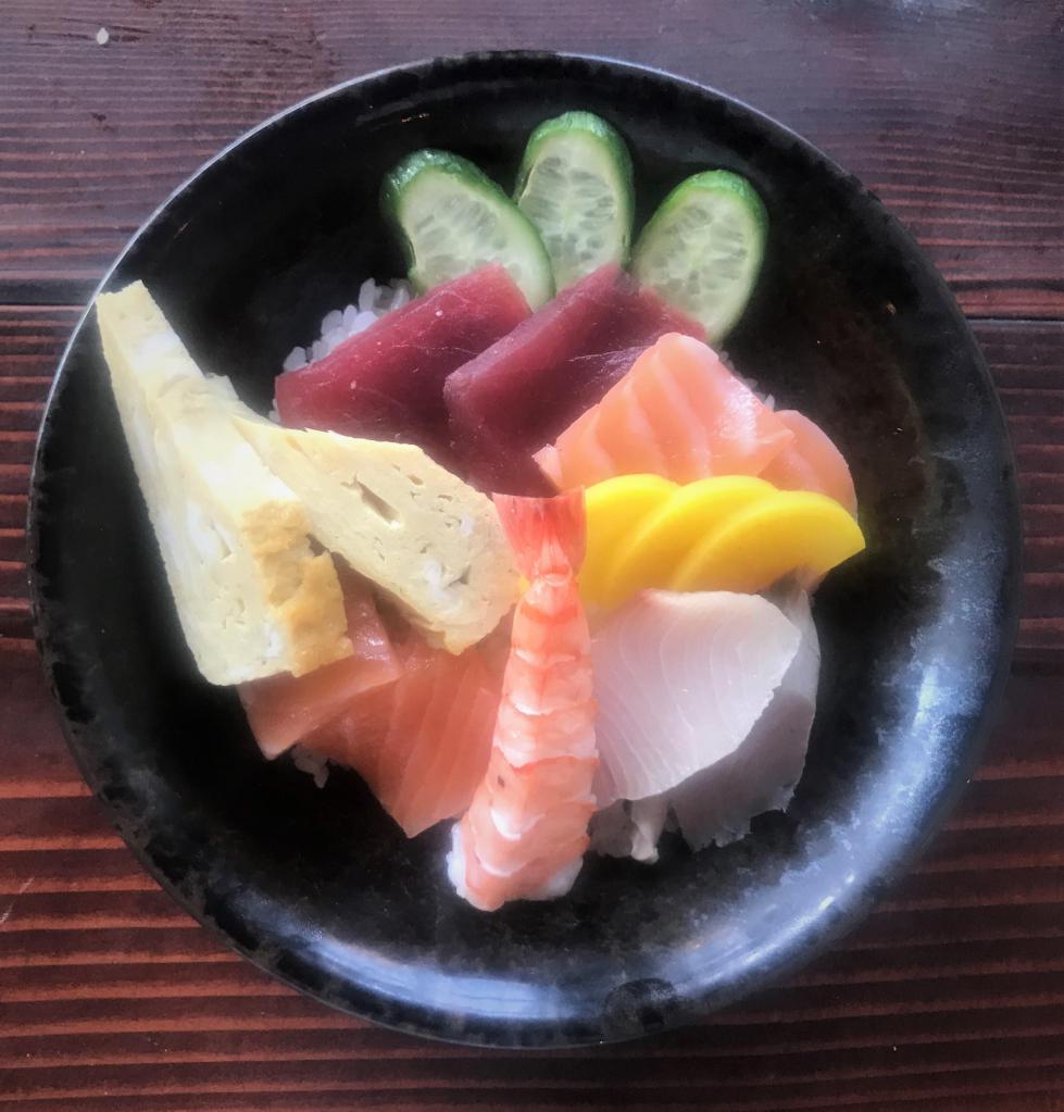 Chirashi Basic · assorted sashimi over sushi rice tuna (1-2 pc/1 oz), salmon (2-3pc/1.5 oz), yellowtail (1-2 pc/1 oz), mackerel or spanish mackerel (1 pc/ 0.75 oz) shrimp (1 ps) and tamago (egg cake 1 pc)