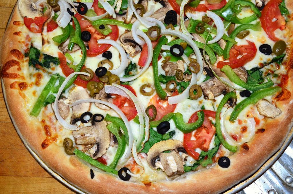 Veggie Pizza · Mushrooms, onions, green peppers, tomatoes and black olives. 