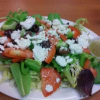 Greek Salad · Cucumbers, tomatoes, bell peppers, feta cheese and olives flavored with house olive oil-lemo...