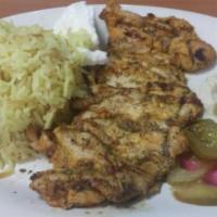 Chicken Fillet Kabob Plate  · Served with rice, salad , hummus , garlic dip and pita bread