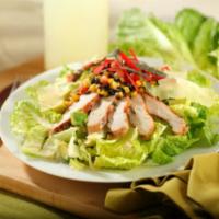 Southwest Chicken Caesar Salad · Romaine lettuce, grilled chicken, spicy Caesar dressing, avocado, black bean and corn salsa,...