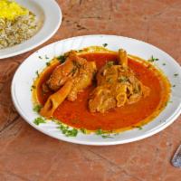 40. Lamb Shank · Baghali polo. Basmati rice mixed with fresh dill and baby lima beans and saffron served with...