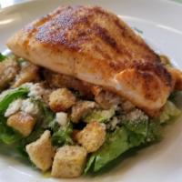 Blackened Salmon Caesar Salad · Crisp romaine, crunchy croutons and Parmesan cheese with house caesar dressing.
