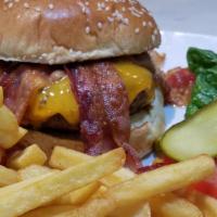 Bacon Cheese Burger · With lettuce and tomatoes on a toasted bun. Served with french fries.