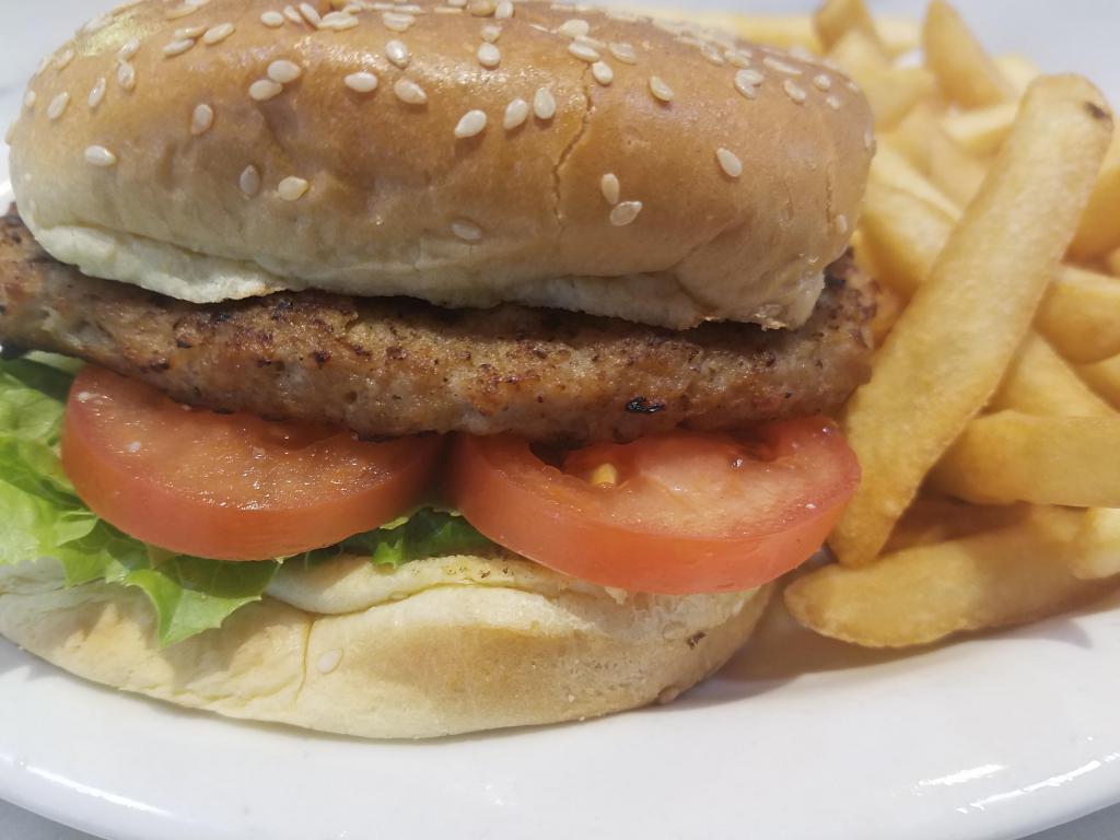 Turkey Burger · With lettuce and tomatoes on a toasted bun. Served with french fries.